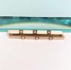 Picture of Edwardian Era Pair Of 14K Yellow Gold, Seed Pearl & White Enamel Bar Brooches