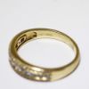 Picture of 14K Yellow Gold, Round Brilliant Cut & Diamond Cluster Accented Two-Piece Bridal Ring Set