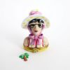 Picture of  Retired Limoges Porcelain Vacationing Lady Trinket Box with Surprise Palm Tree Inside. 