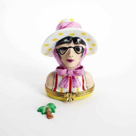 Picture of  Retired Limoges Porcelain Vacationing Lady Trinket Box with Surprise Palm Tree Inside. 