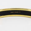 Picture of Vintage Hermès Orange Enameled Bangle Bracelet with Perfume Bottle Motif